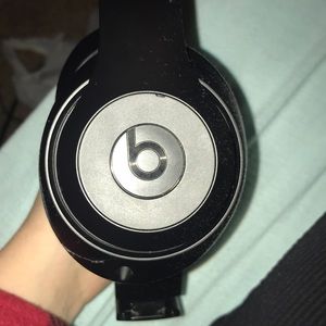 pair of beats wireless headphones.